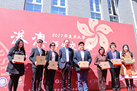 Prof. Chen Zhimin (fourth from left), Associate Vice President of Fudan University, presents souvenirs to representatives of Hong Kong universities